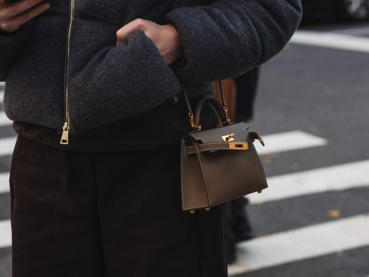 How Are Exquisite Embellishments Added to Designer Bags?